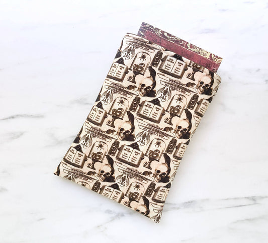 Curiosity shoppe - padded book sleeve, book pouch: Small